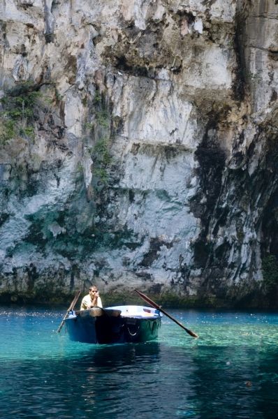 A tour guide takes a break in the Melissani caves of Kefalonia