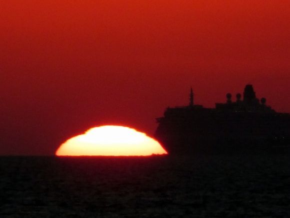 Sunset in Rhodes - Passenger Ferry Passing the Sunset 2015