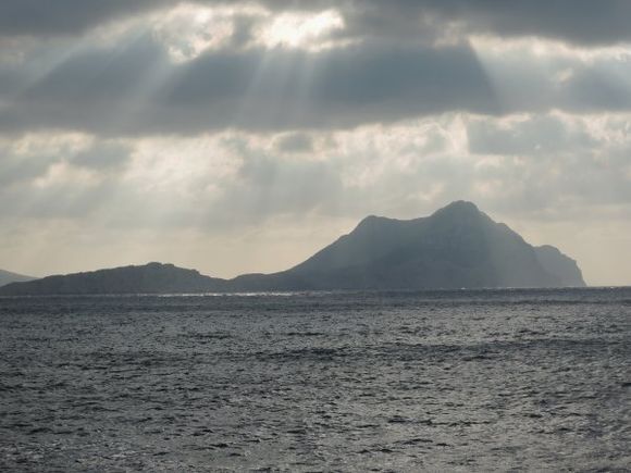 Sunlight over Nikouria island on Amorgos