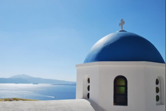 traditional blue-domed church in Santorini (Oia)