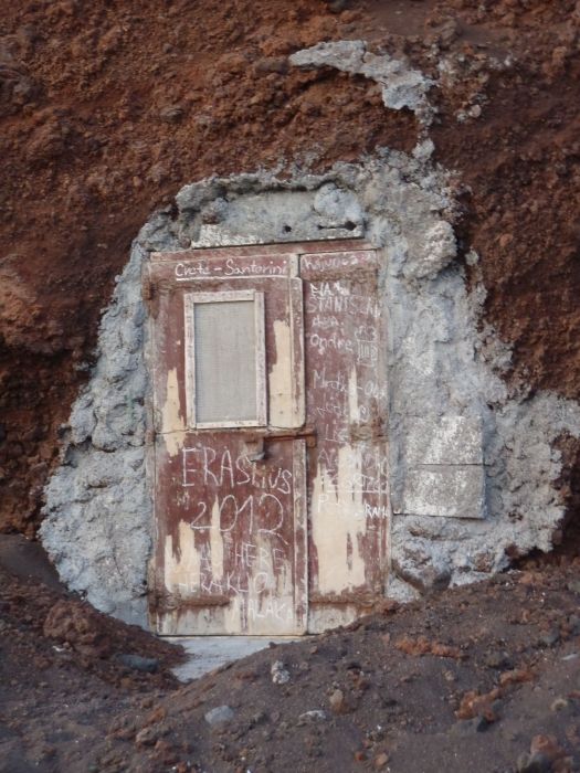 A door in the cliff at Red Beach