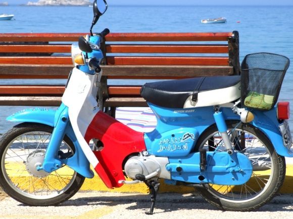 Moped in Arillas Bay