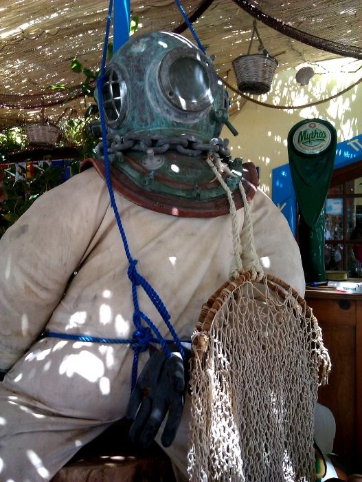 Kalymnos island, the old diving suit in the Captain Kostas Tavern in Emborios beach