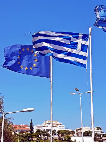 Rafina august 2017, flags close to the port.