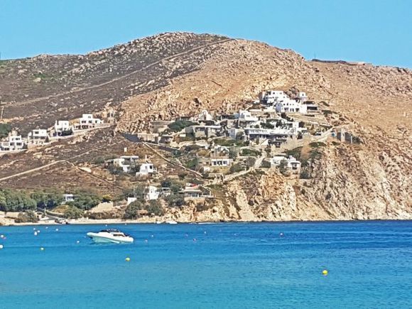 Mykonos august 2017, Elia is the last stop on the caique (traditional fishing boat used as taxi boat) so slightly quieter. Lots of nudists come here. It is a quiet beach unlike Paradise, Super Paradise and others. There is a nice view to the left up the hill, enjoy the traditional Cycladean houses.