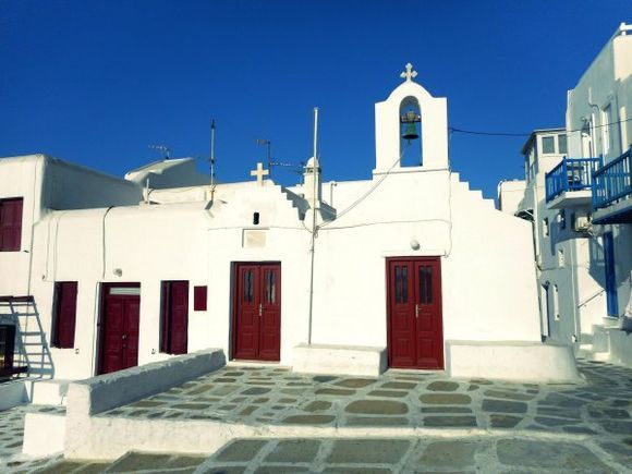 Mykonos august 2017, the church in front of the 5 windimills!