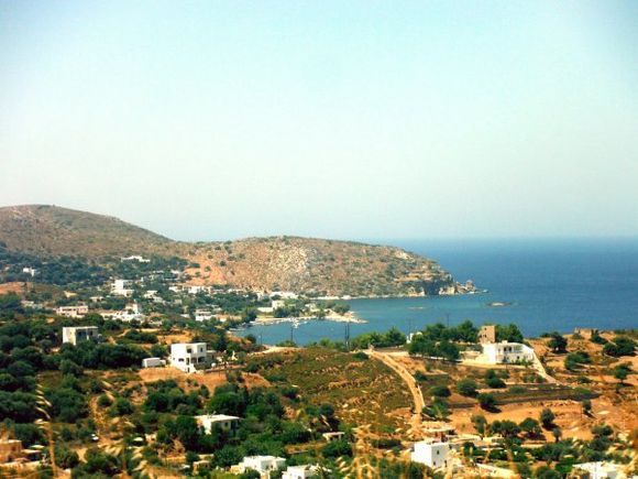 Leros july 2015, view from Xirokambos that is popular among tourists who want to go on an excursion from Kalymnos, and enjoy the soft golden sands surrounded by tamarisks trees, which bring some shadow and refreshment. The place enjoys a stunning view to the mountains of Kalymnos and to some islets popping up from the sea nearby, such as Velona or Glaronisi.