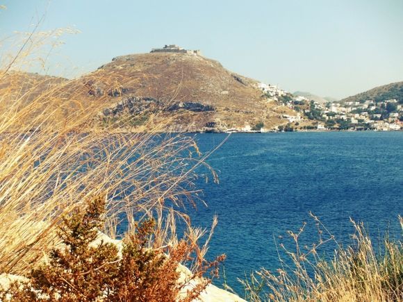 Leros island, Dioliskaria beach, in the backgroung Panteli and the Medieval Castle