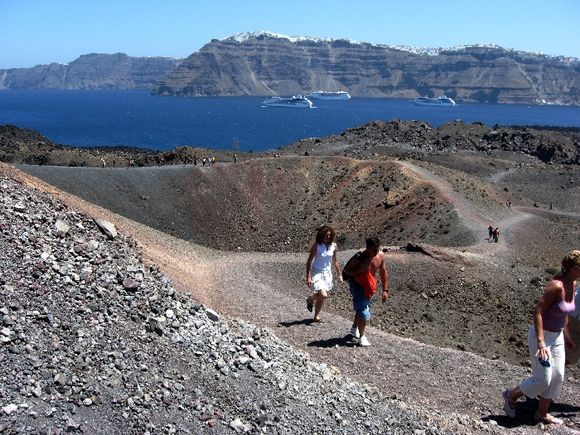 Santorini, Volcano NEA KAMENI, in the background the view of Fira and Imerovigli