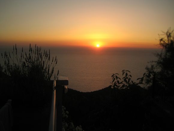 Lefkada, sunset from the H Paxn restaurant in Exanthia-Rachi, a traditional village located in a mountainous region. From here, you can eat delicious meals!