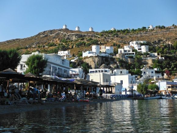 Leros island, view of Pandeli beach, in the background the windmills
