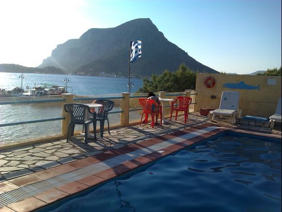 Kalymnos island, the swimming pool in the Babis bar, in the background the island of Telendos