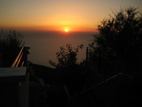 Lefkada, sunset from the H Paxn restaurant in Exanthia-Rachi, a traditional village located in a mountainous region. From here, you can eat delicious meals!