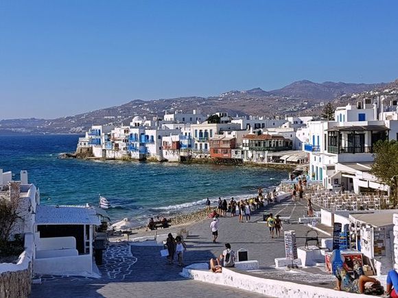 Mykonos august 2017,  Little Venice is one of the most romantic places in the whole of Mykonos. This neighborhood is replete with elegant and gorgeous old houses that are situated precariously on the edge of the sea. Many discerning travelers in the past have fallen in love with this charming quarter to its magnetic appeal.