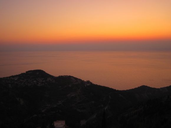 Lefkada, sunset from the H Paxn restaurant in Exanthia-Rachi, a traditional village located in a mountainous region. From here, you can eat delicious meals!