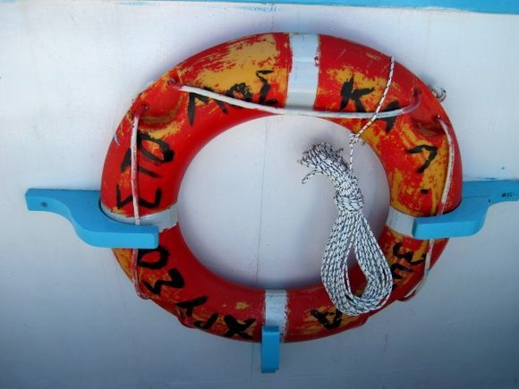 Kalymnos island, life belt in a boat in Myrties port