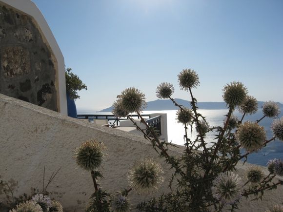 Santorini, a view from from the Hotel Reflexion in Fira, in front of the Volcano.