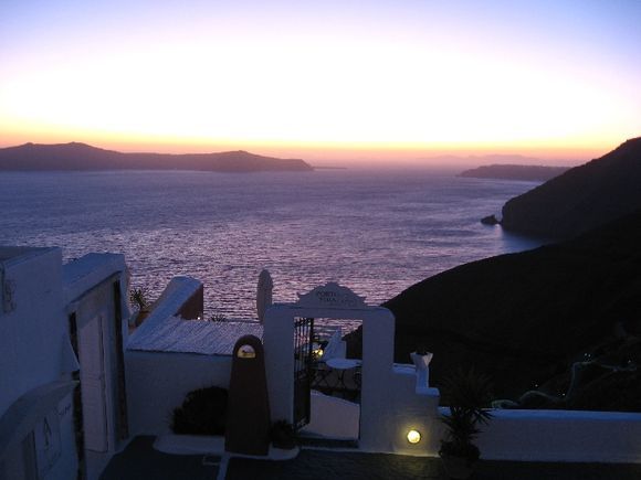 Santorini, sunset view from the Reflexion Volcano Hotel in Fira