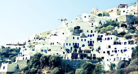 Beautiful shot displaying the traditional Greek white and blue architecture in Oia