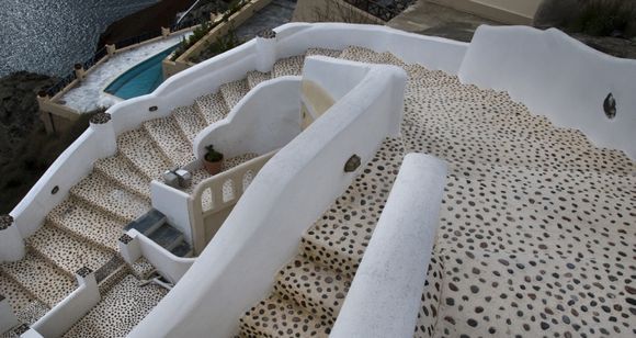 Location: Oia, a colourful staircase of a house.