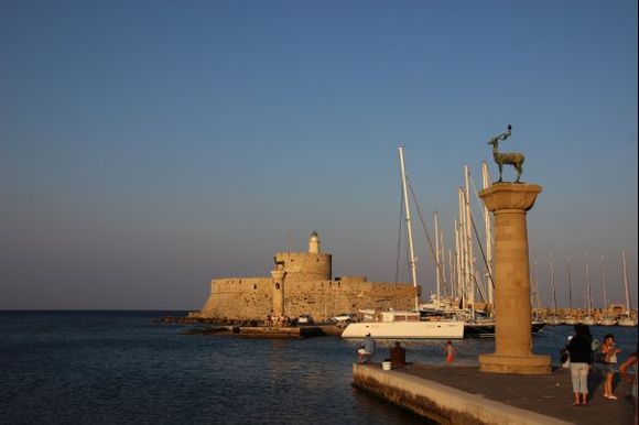 The port and the Agios Nicolaos fort .