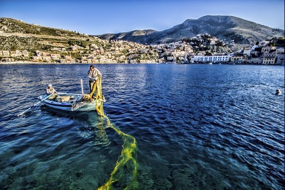 Something for the weekend. Fishing just outside Symi harbour.