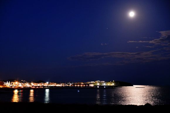 Full moon over Tinos city.