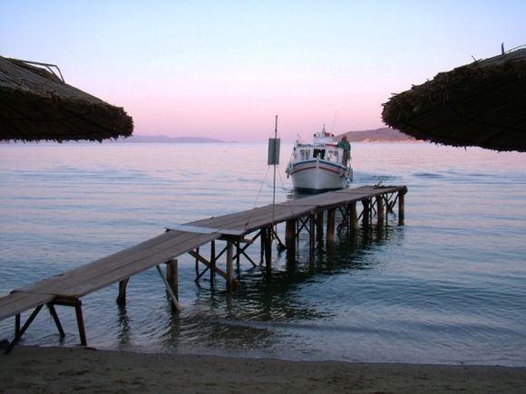 Skiathos.
Little ferry arriving at Achladies from Skiathos Town
