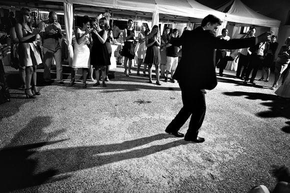 Greek wedding in the village Vlasti in Northern Greece. The father of the bride does the traditional dance.