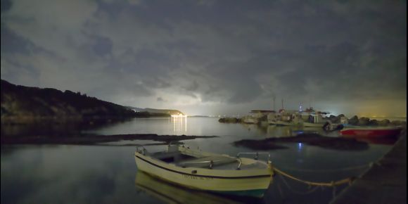 Night time from Kalivoitis harbor looking towards Petriti with a painterly feel.