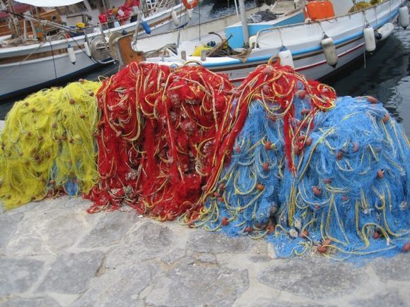 Colorful fishing nets drying in the warm sun