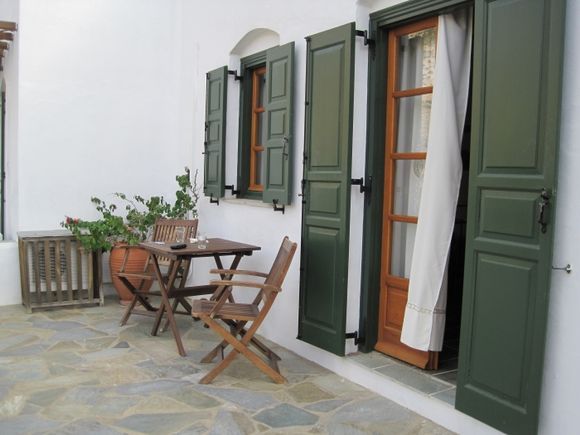 A Classic Courtyard to Enjoy the Mountain and Harbor Views from at Kamares!