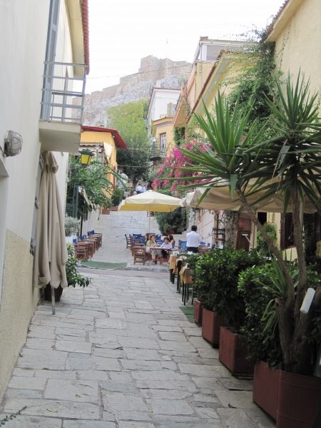 A lovely lane lined with tavernas and with a view of the Acropolis!