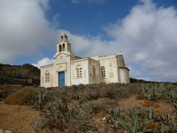 This classic Greek Church contrasts beautifully with the barren landscape on the island of Tinos, one of Greece's most traditional and non-touristy islands!
