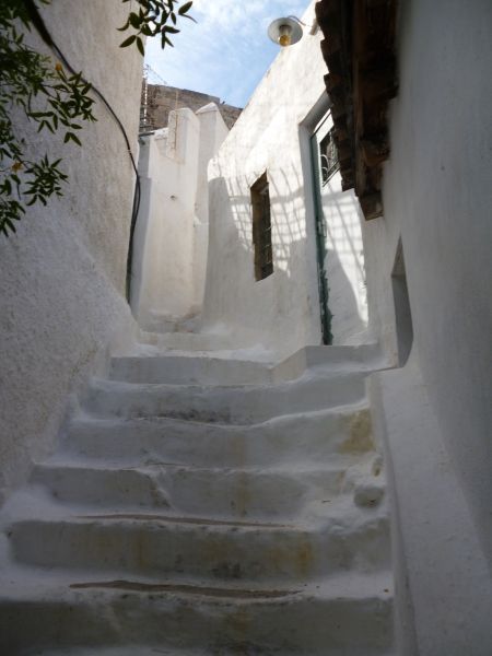 Anafiotika, Athens, a beautiful whitewashed lane leads you to even higher ground.