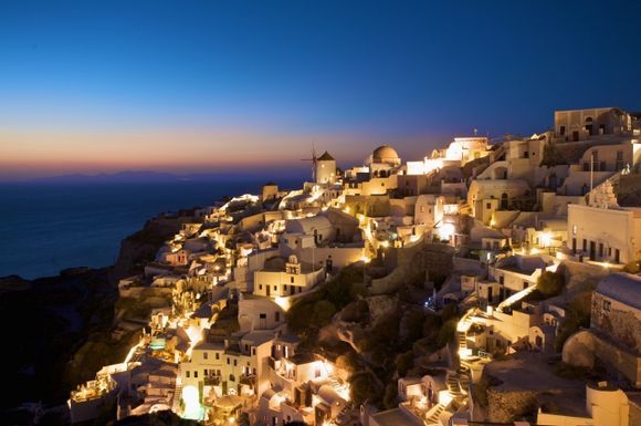 Santorini, golden city after dusk