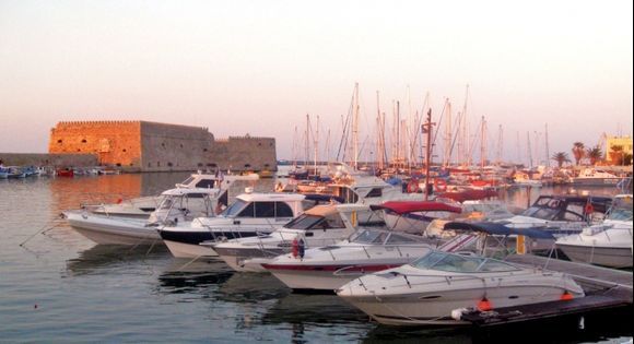 This shot is of Heraklion harbour, Crete One summers evening after visiting the castle, we stayed around for the sunset, and captured the changing colours over the harbour. 
Lens - 6mm
Apeture -  F8
Shutter Speed - 1/125
ISO - 400