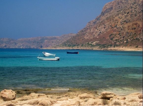 This photo is of Balos Lagoon, which is 56km northwest of Chania and 17km northwest of Kissamos, Crete.
It is a such a beautiful place with crystal clear aquamarine warm waters, and pure white sand.