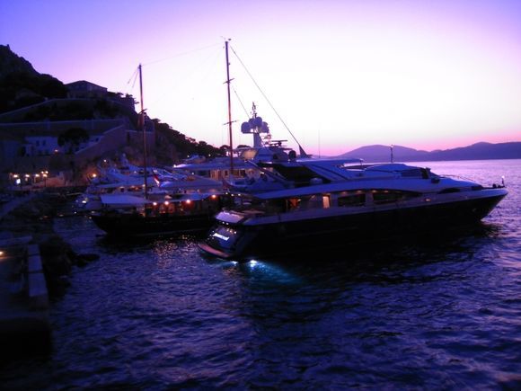 hydra port town,boats in twilight