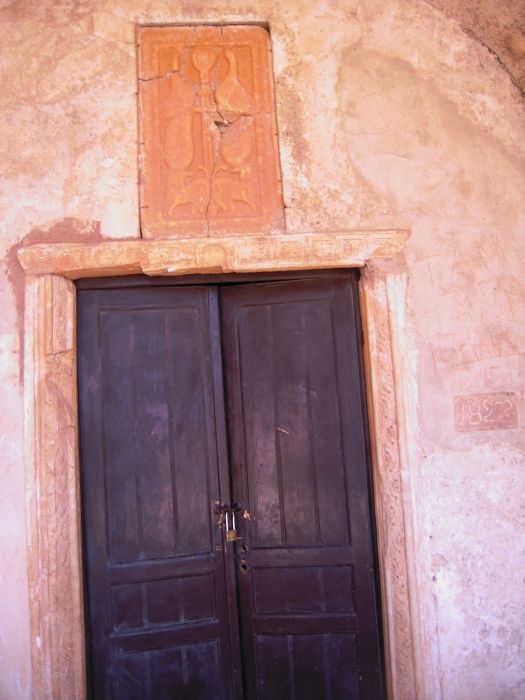 Monemvasia, the crest and the door of agia sofia.
