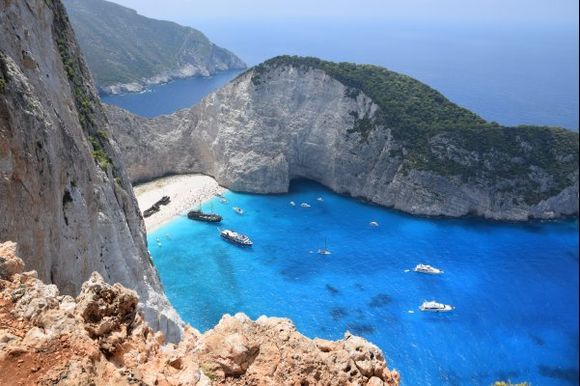 The most known beach in Greece ( I think ) Navagio Beach.