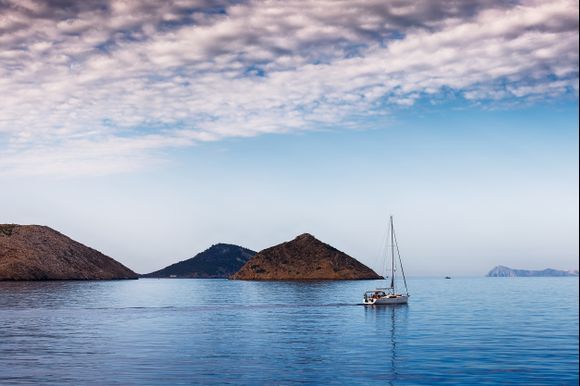 A sailboat off the coast of Symi