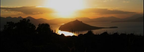Sunset taken from Aiginitissa towards the island of Moni