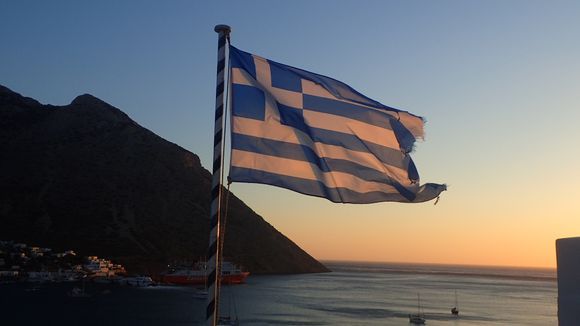 Greek flag at sunset.