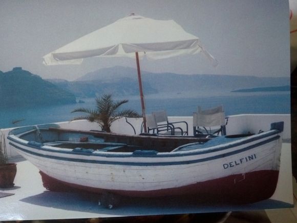 Sightseeing in Santorini, and this beautiful boat with Delfini written on it caught my eye! How beautiful!