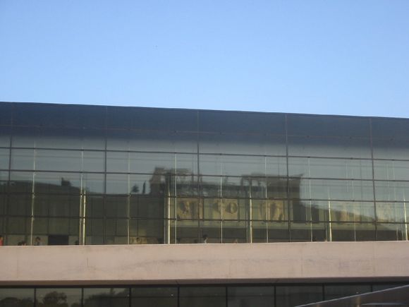 Reflection of the real Acropolis on the windows of the new museum