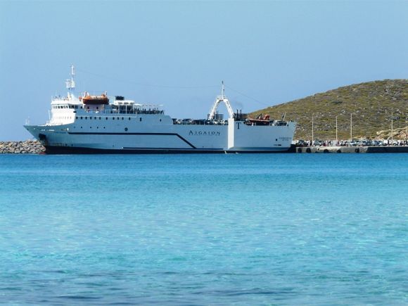 The ferry sits on the serine waters as it unloads in the port of Diakofti, Kythira.