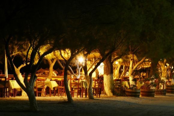 The gorgeous night time scenery at a popular restaurant right on the shore at Diakofti. Just magic!