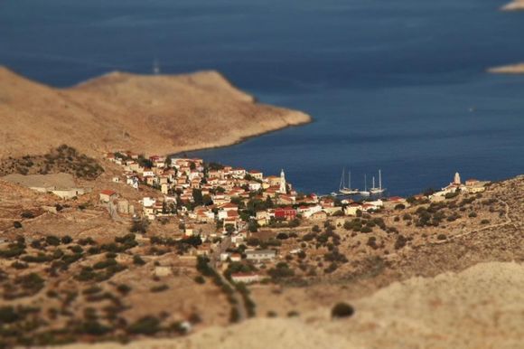 Looking back at Halki from the top of the 14th century fort, using a technique called tilt-shift where it makes things appear miniature