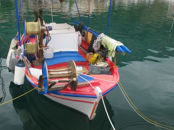Colorful fishing boat in Kalamos harbour